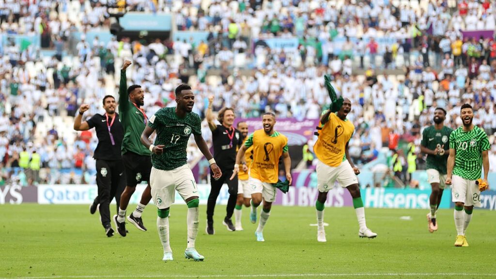 Saudi Arabian players celebrate the victory against Argentina (2-1)