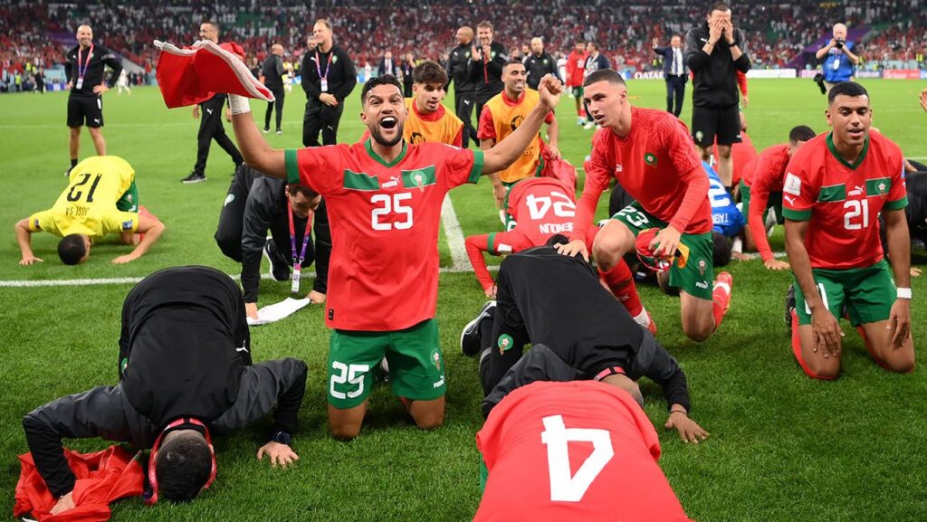 Moroccan players celebrate their pass to the semifinals
