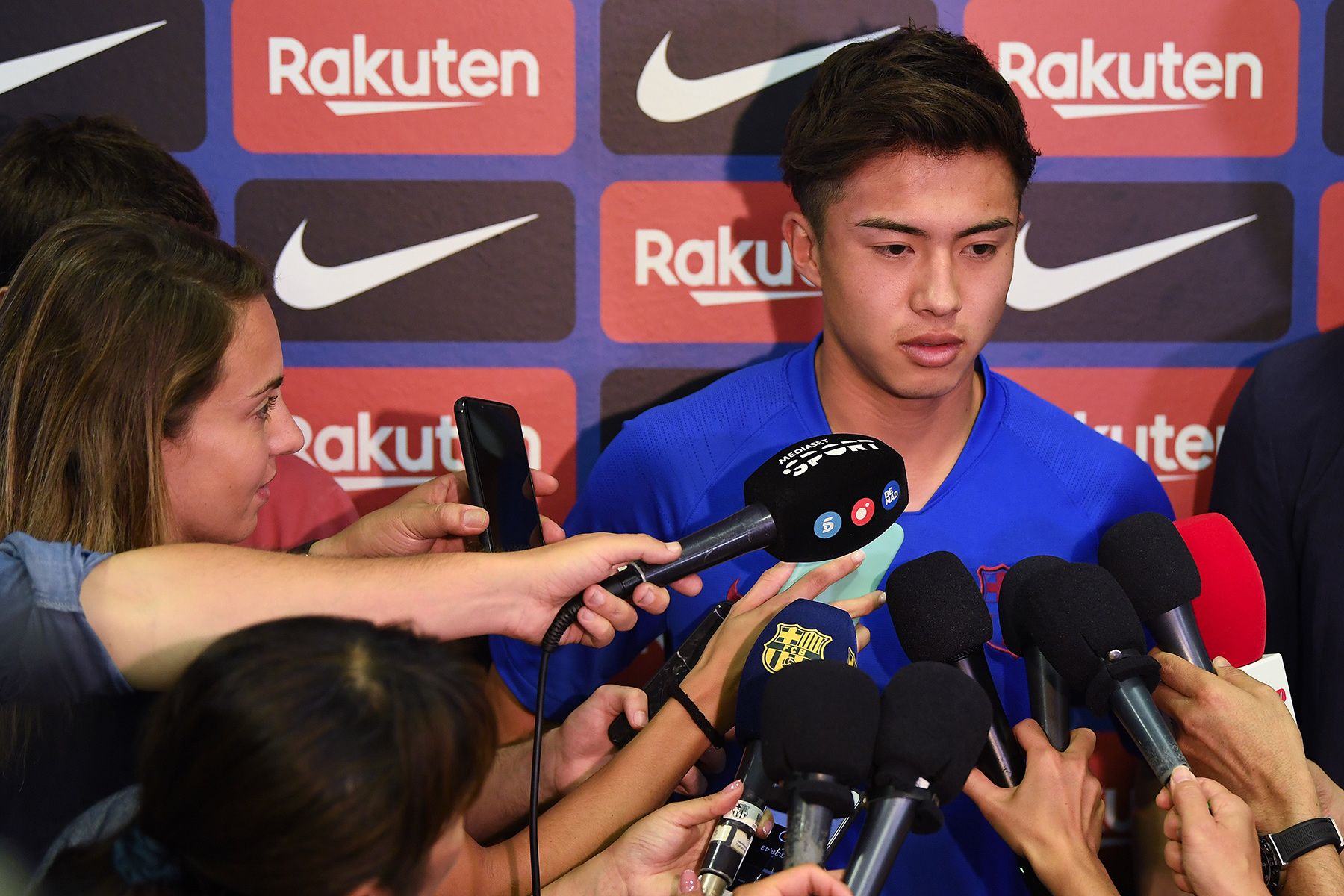 Hiroki Abe, interviewed by the media after a training