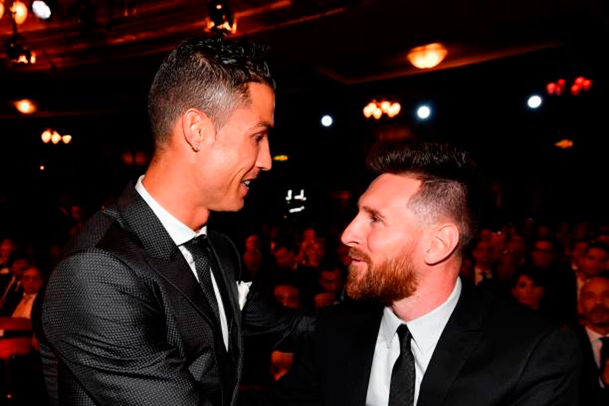Cristiano Ronaldo, next to Leo Messi
