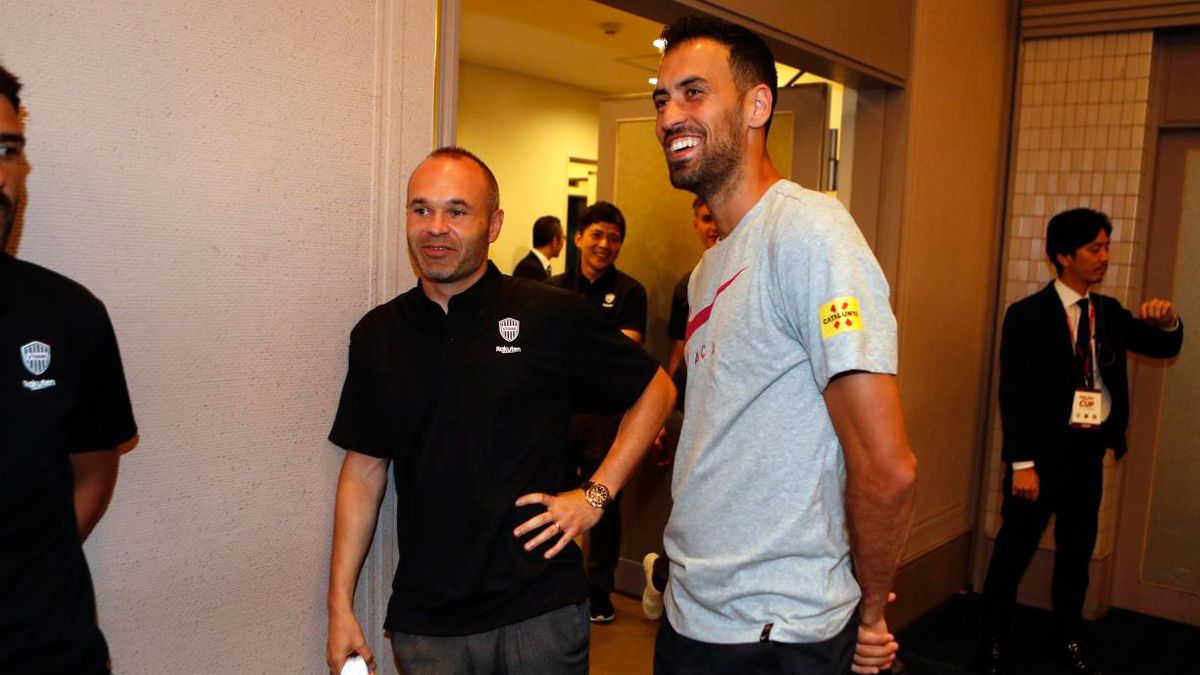 Sergio Busquets and Andrés Iniesta in an act in Japan