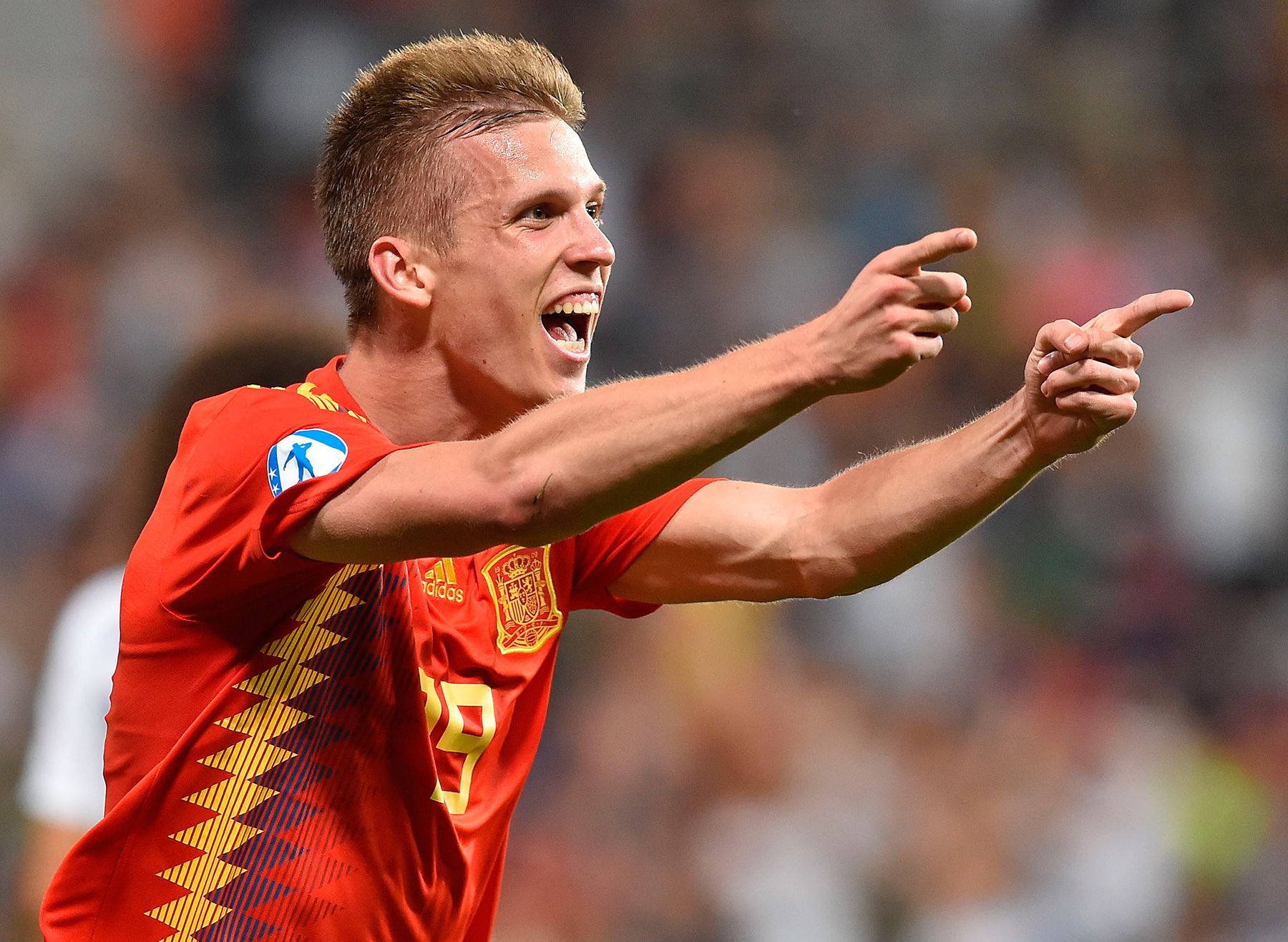 Dani Olmo celebrates a goal with the Spanish sub 21 team