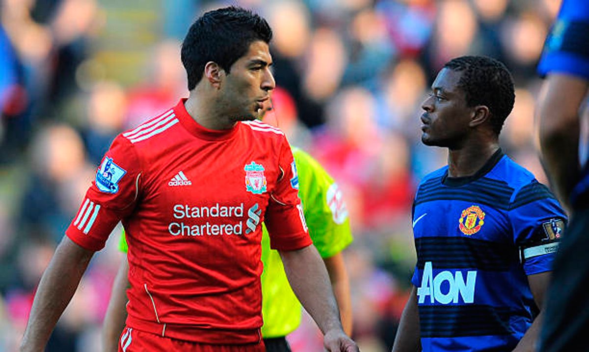 Luis Suárez and Patrice Evra, in a Liverpool-United