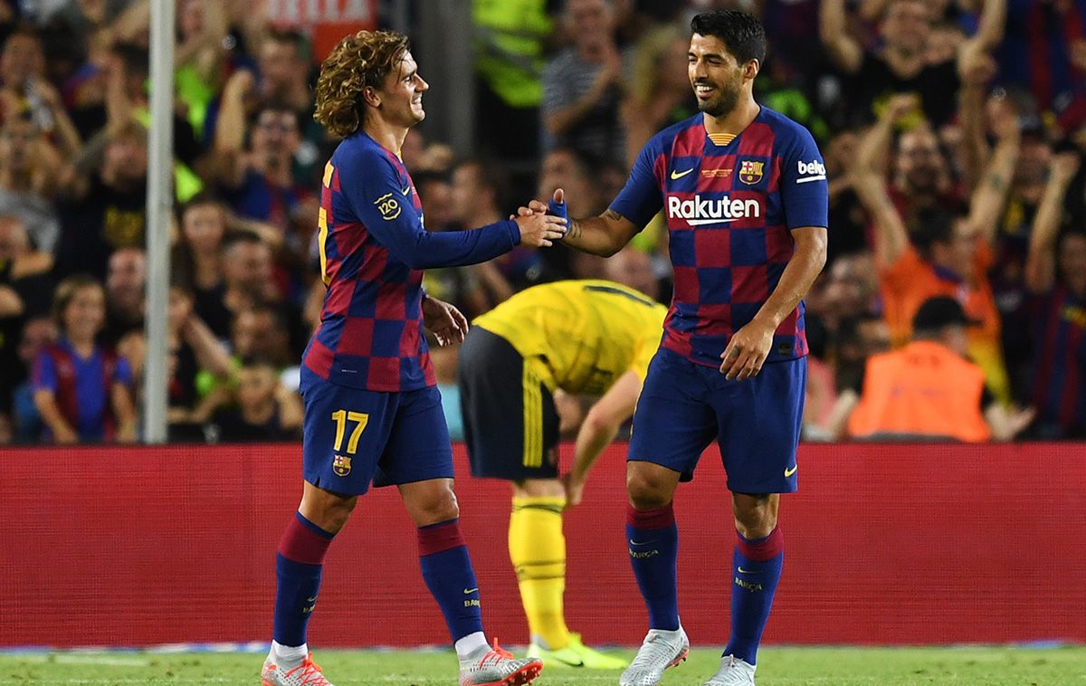 Griezmann and Luis Suárez, celebrating a goal