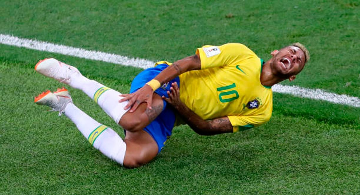 Neymar, injured with Brazil