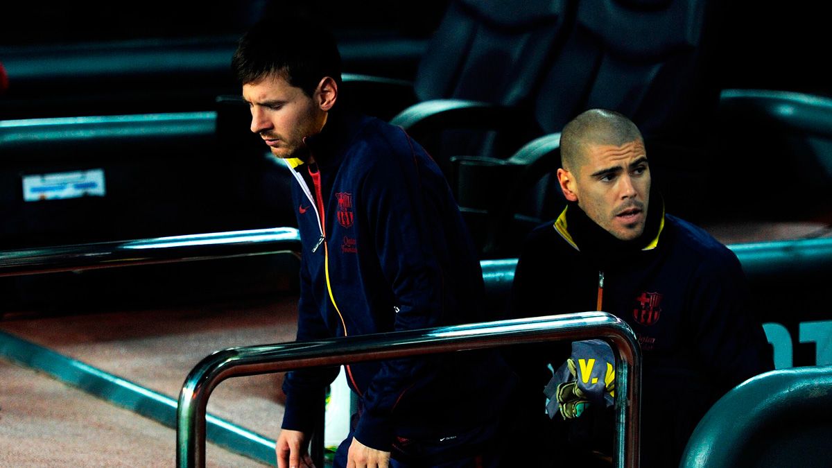 Víctor Valdés y Leo Messi en un partido del Barça