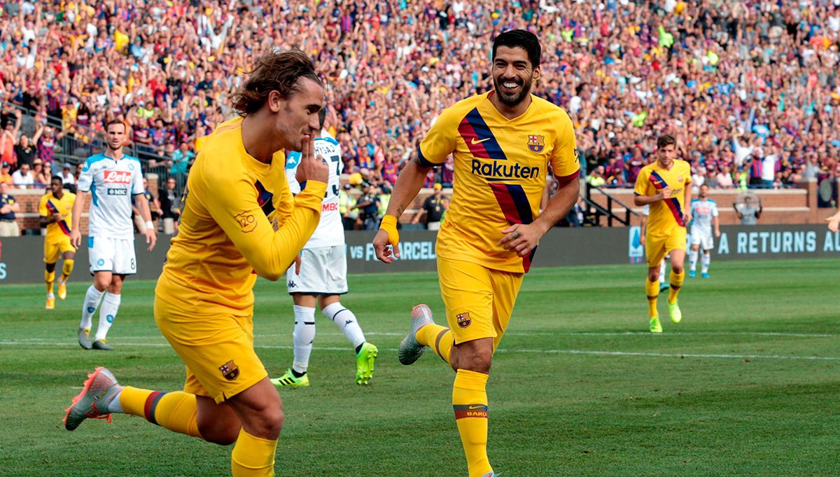 Antoine Griezmann and Luis Suárez, celebrating a goal with Barça