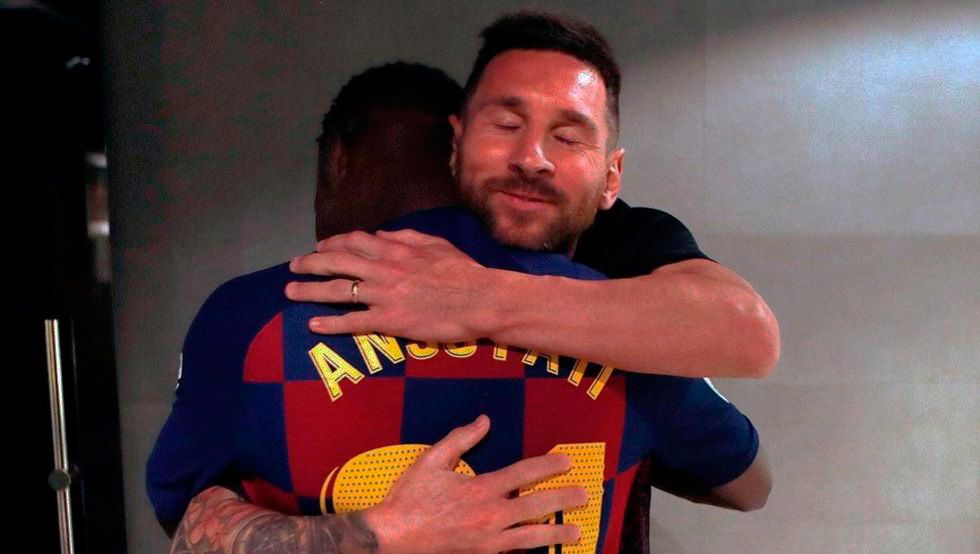 Leo Messi and Ansumane Fati, embracing in the Camp Nou