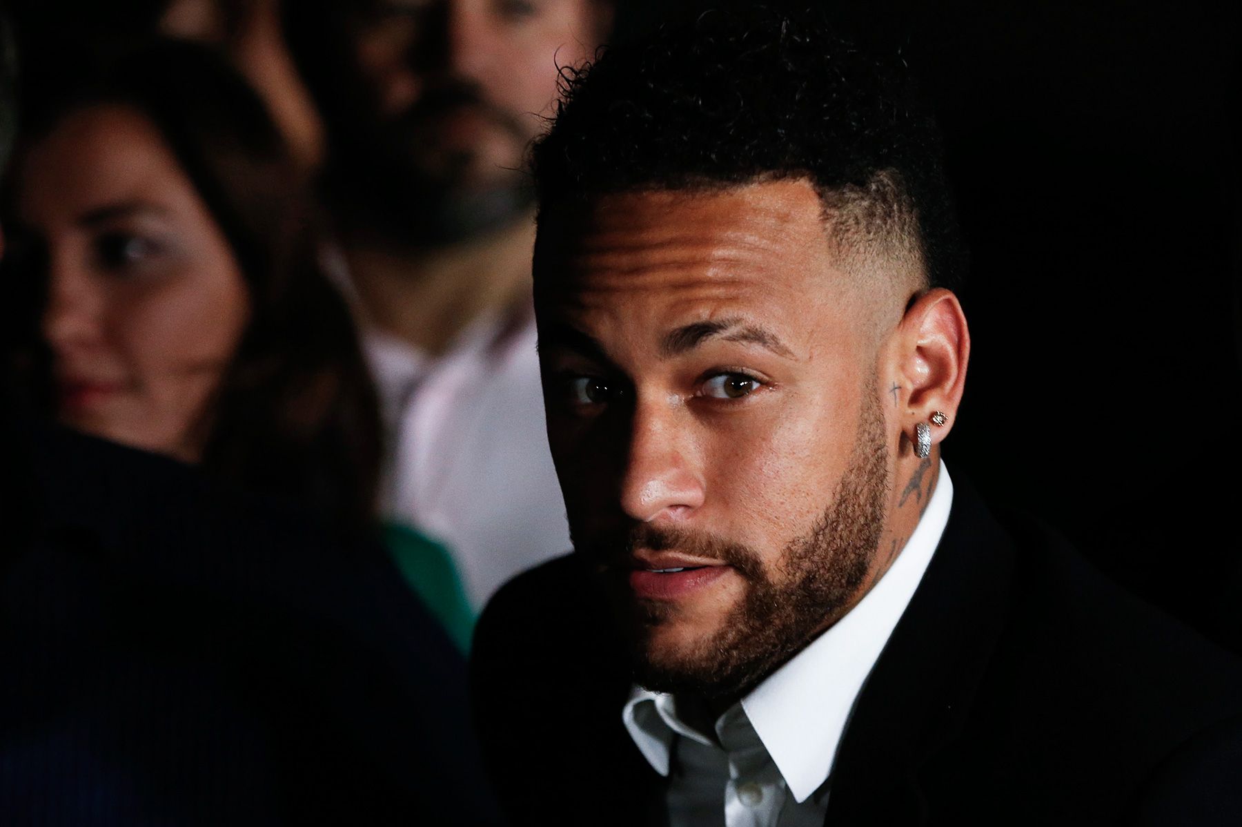 Neymar In an act dressed of suit