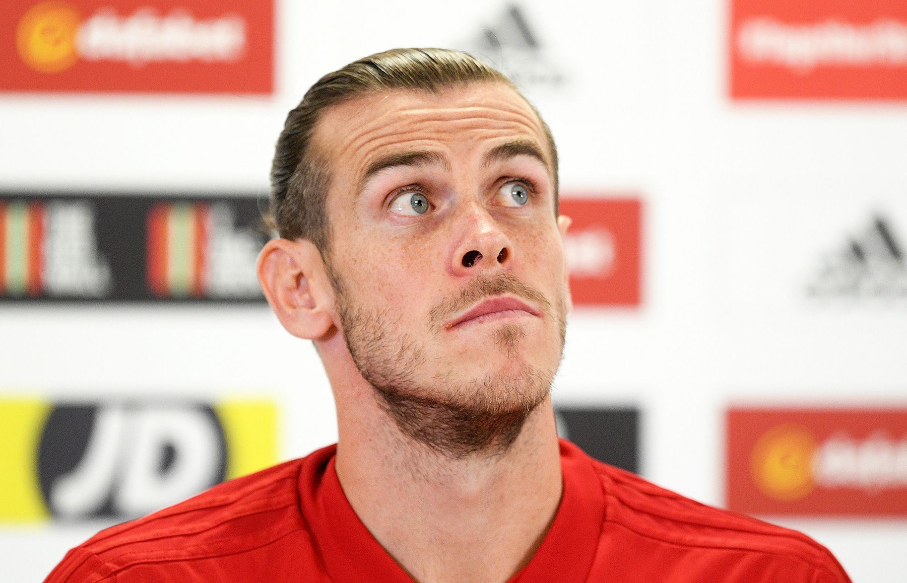 Gareth Bleat in a press conference with Wales