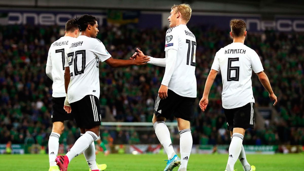 The players of Germany celebrate a goal to Northern Ireland
