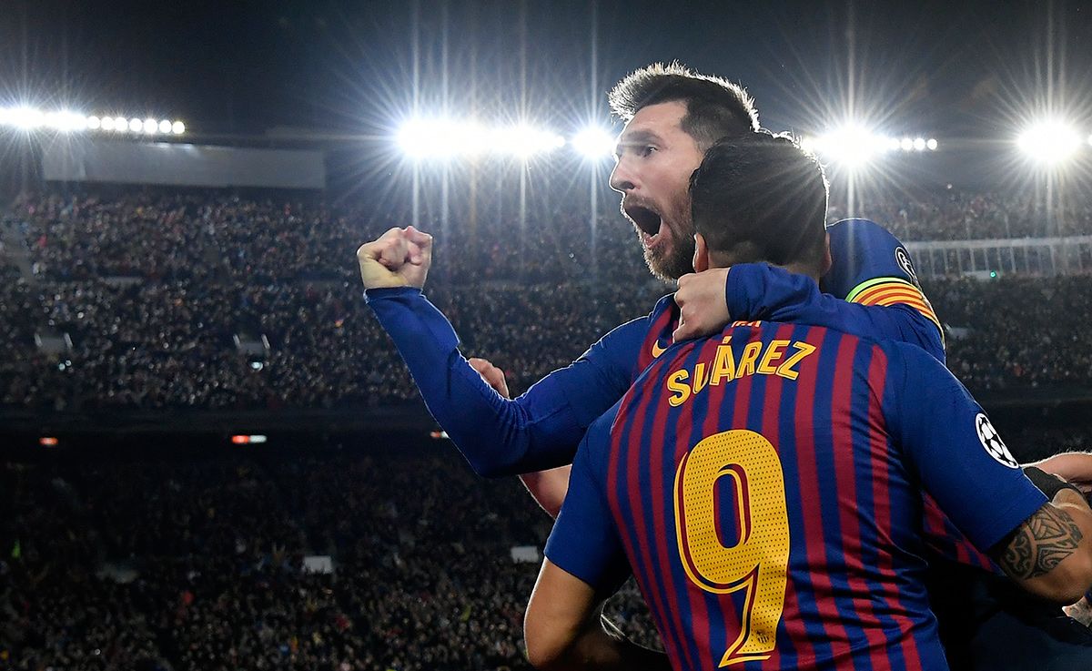 Leo Messi and Luis Suárez, celebrating a goal with FC Barcelona