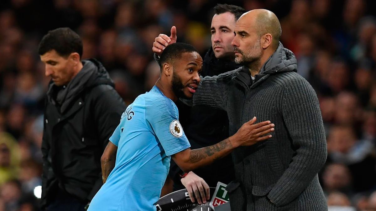 Raheem Sterling and Pep Guardiola in a Premier League match