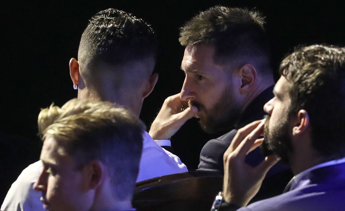 Leo Messi and Cristiano Ronaldo, conversing during a ceremony