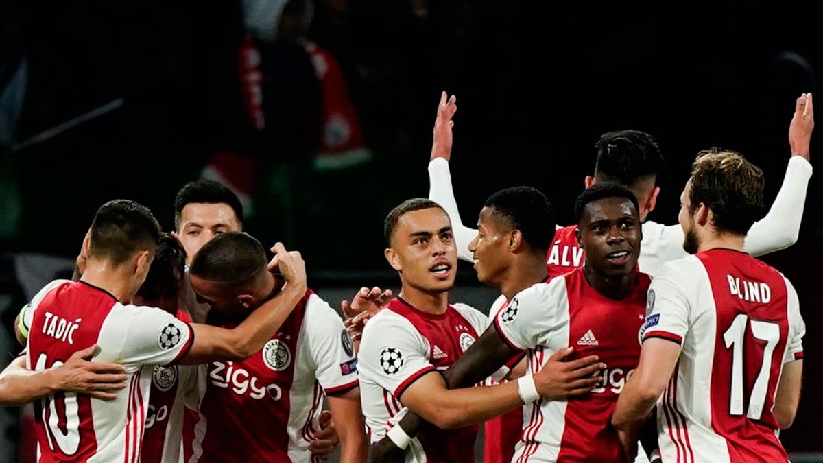 The players of Ajax celebrate a goal in the Champions League