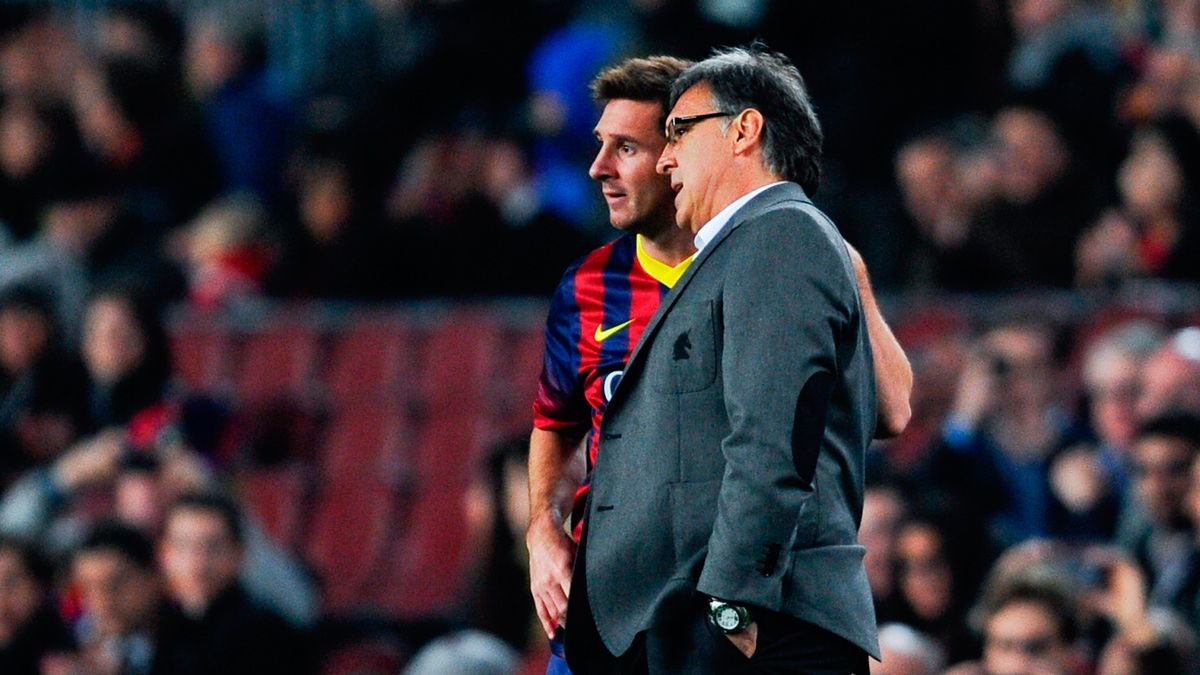 Gerardo Martino y Leo Messi en un partido del Barça