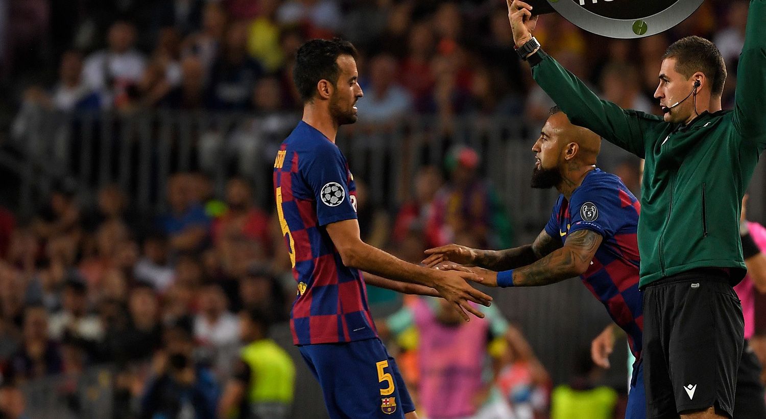 Busquets being substituted by Vidal