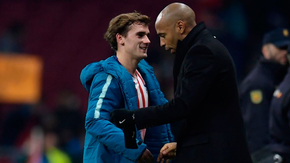 Antoine Griezmann y Thierry Henry en un partido de Champions