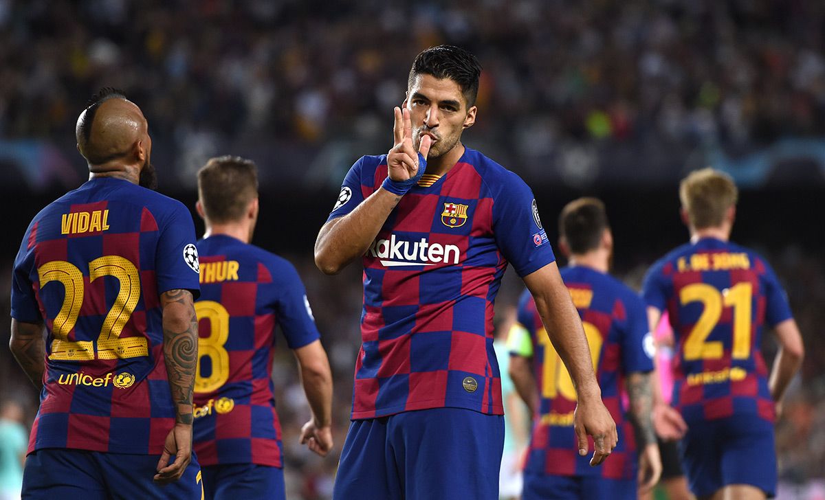 Luis Suárez, celebrando un gol marcado contra el Sevilla