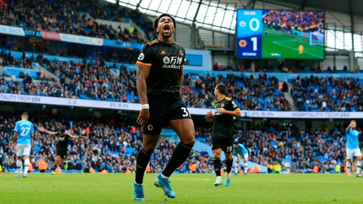 Adama Traoré celebrates a goal with Wolverhampton to Manchester City