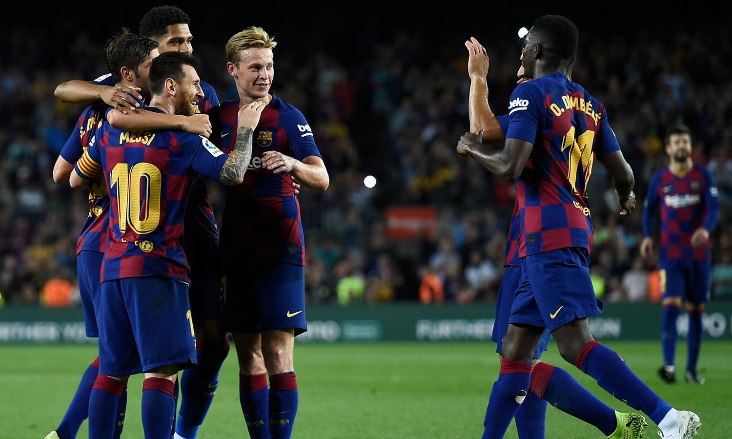 The players of the Barça celebrate a goal against the Seville