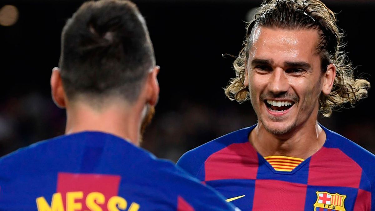 Antoine Griezmann and Leo Messi celebrate a goal of Barça