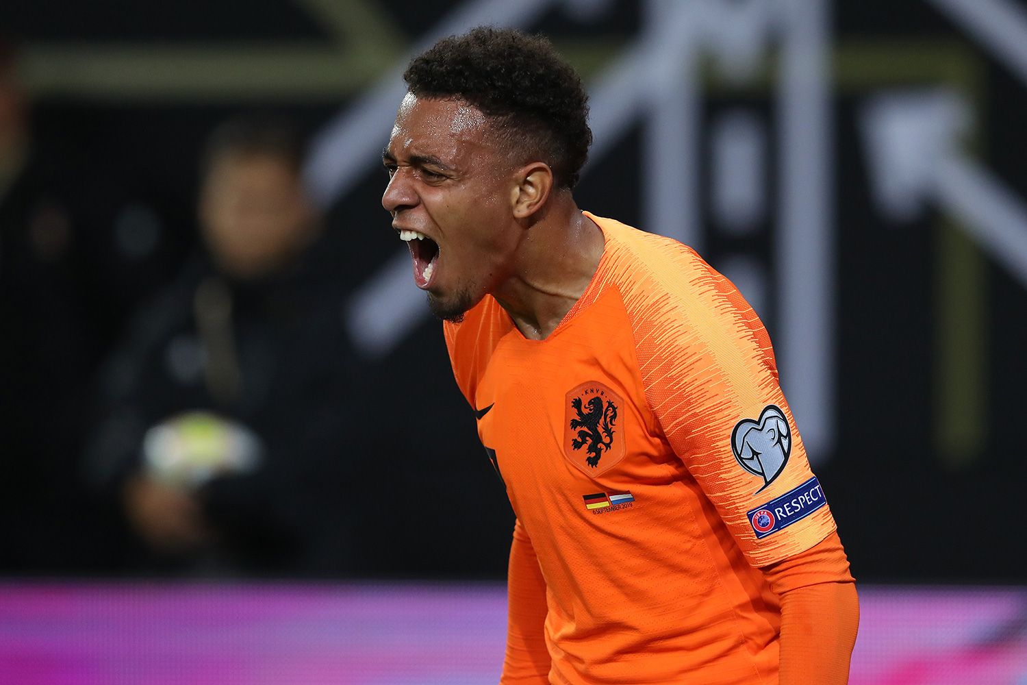 Malen, forward of Holland, celebrates a goal