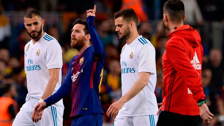 Leo Messi celebrates a goal in a Clásico in the Camp Nou
