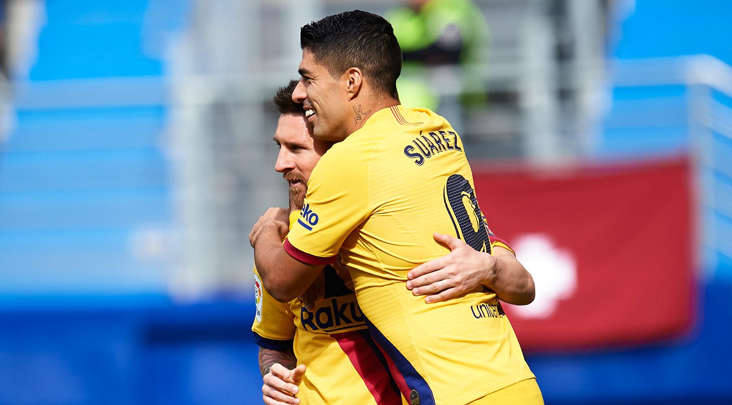 Luis Suárez and Messi celebrate a together goal