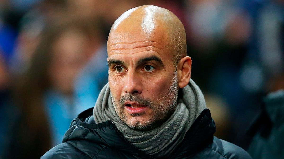 Pep Guardiola in a match with Manchester City
