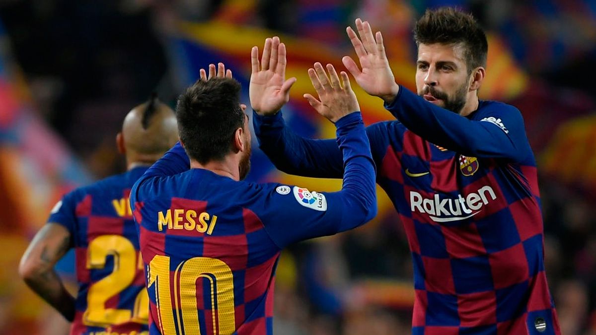 Gerard Piqué y Leo Messi celebran un gol del Barça