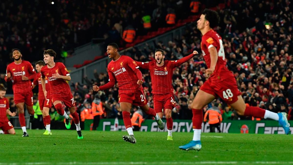 The players of Liverpool celebrate a victory in the Carabao Cup