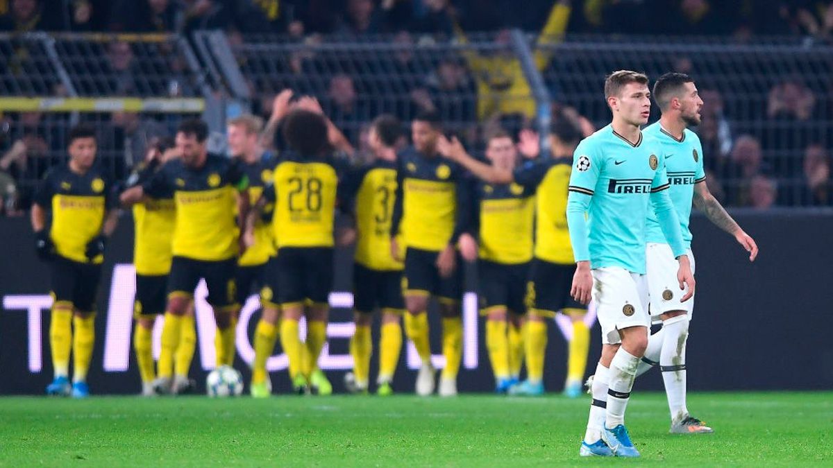 Borussia Dortmund players celebrate a goal against Inter Milan