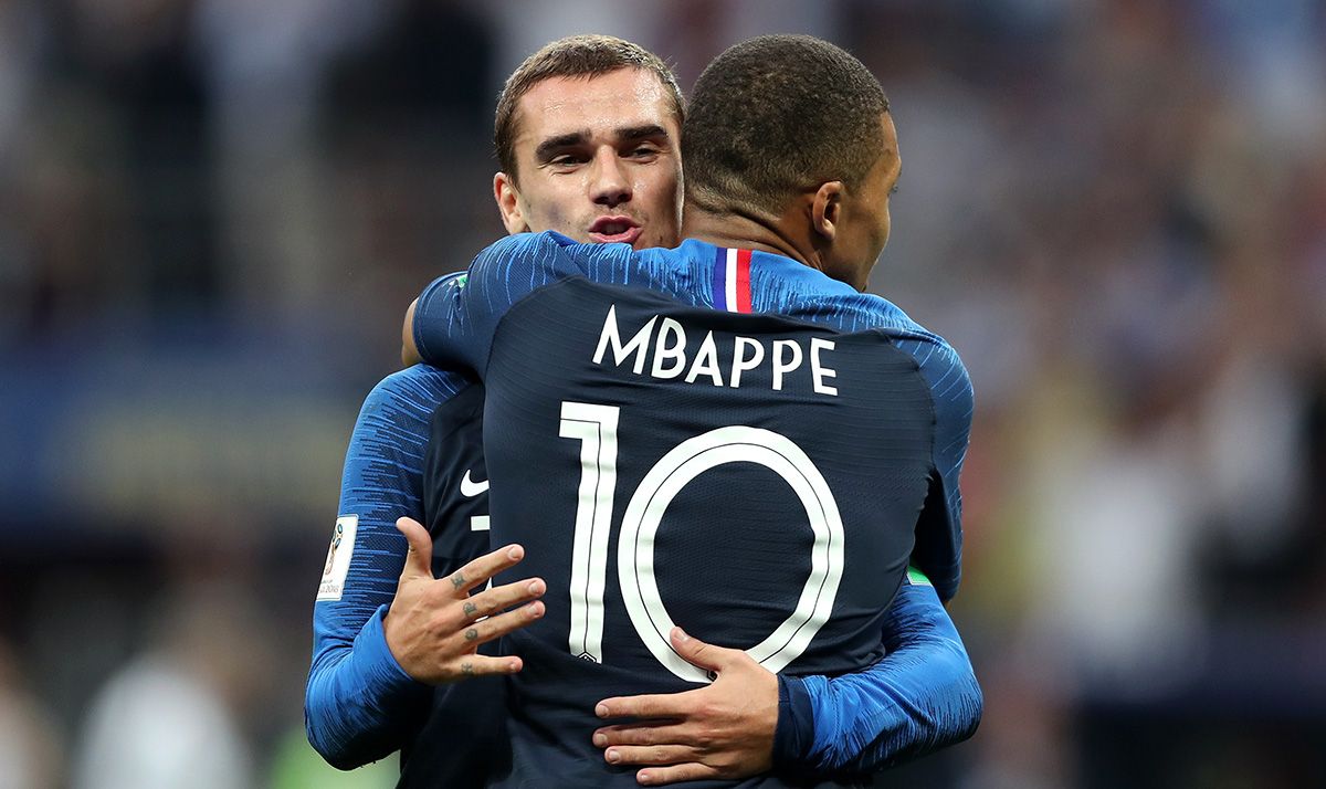 Kylian Mbappé and Antoine Griezmann, celebrating a goal with France