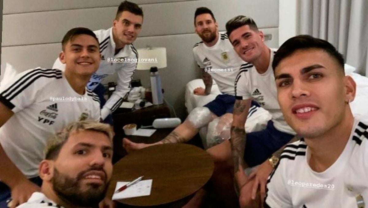 Messi, resting with his mates after the Brazil-Argentina