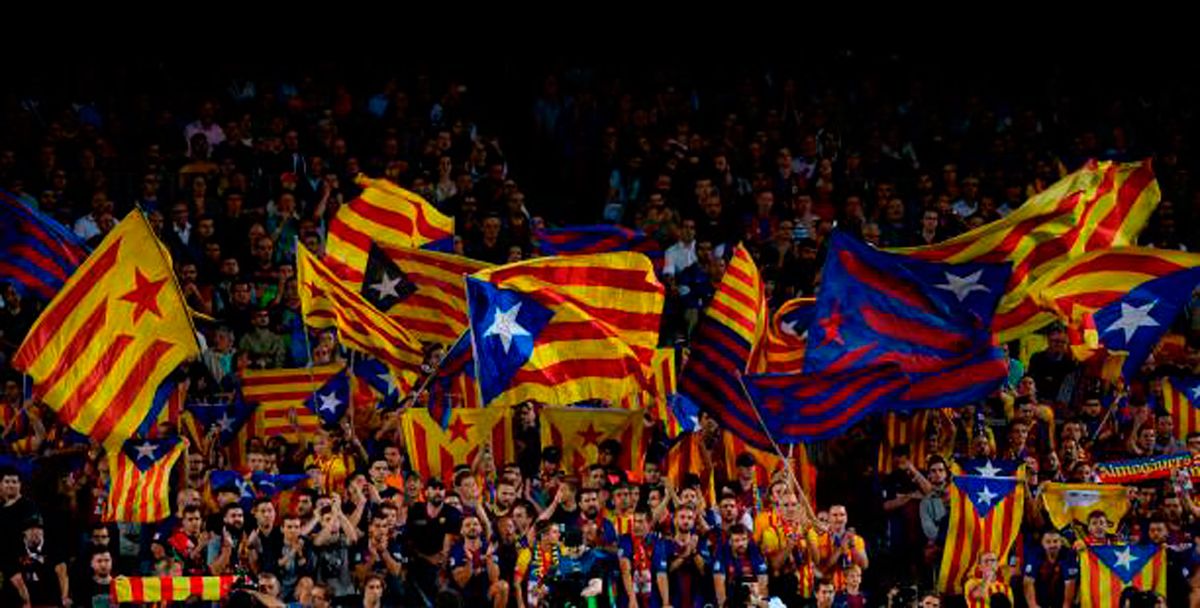 Esteladas waving in the Camp Nou