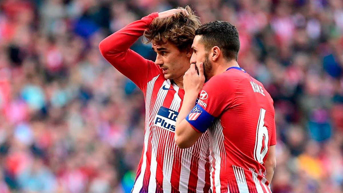 Antoine Griezmann and Koke in a match of Atlético de Madrid