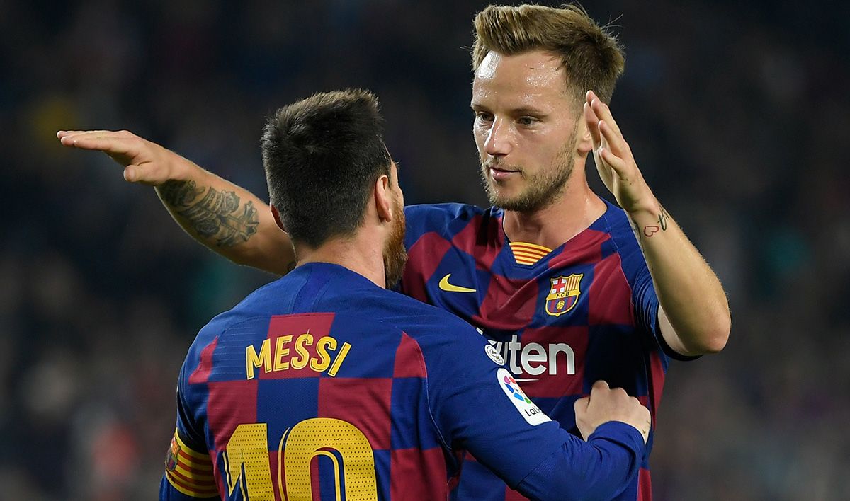 Leo Messi and Rakitic, celebrating a goal with the FC Barcelona