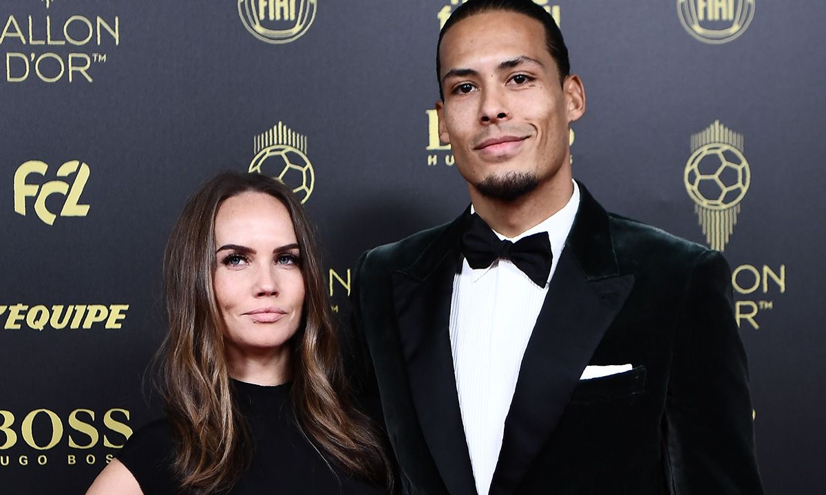 Virgil van Dijk, posing in front of the cameras with his couple