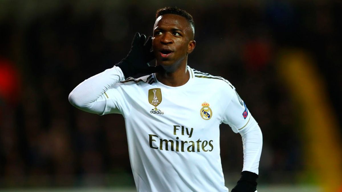 Vinicius celebrates a goal with Real Madrid in the Champions League