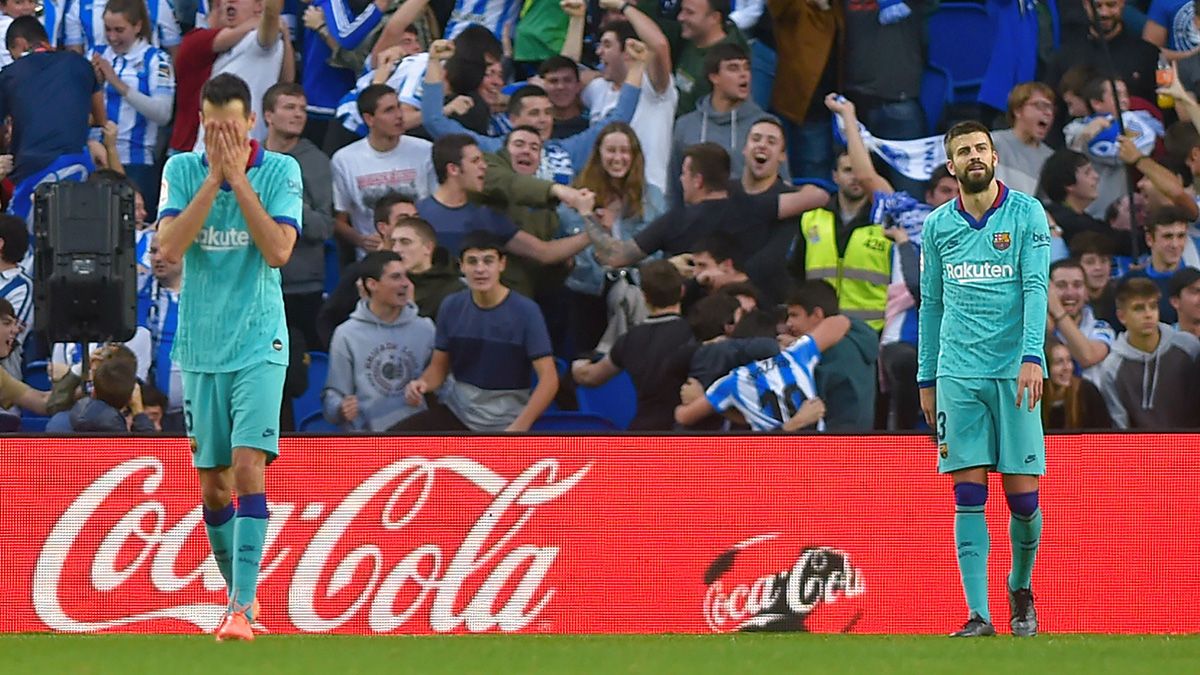 Sergio Busquets and Gerard Piqué in a match of Barça