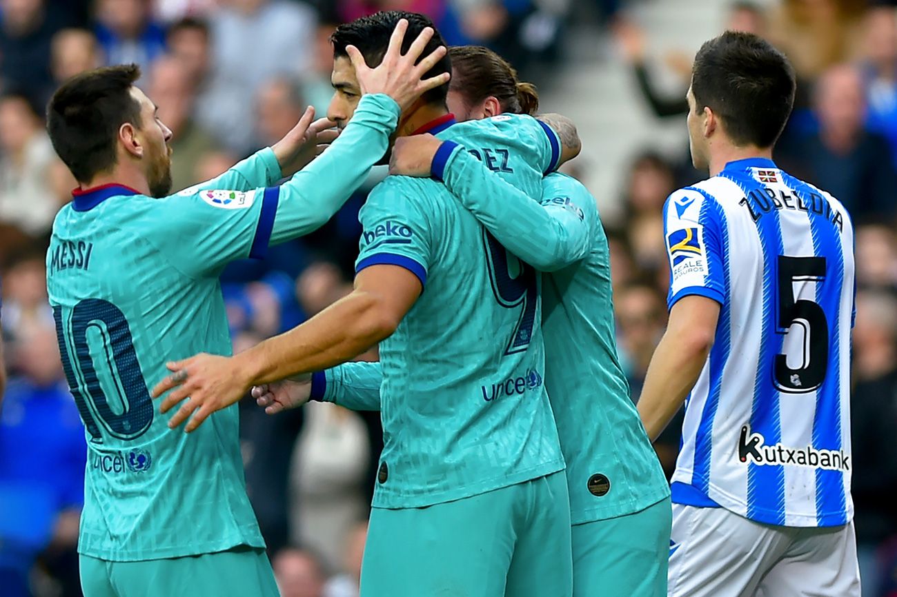 Messi, Suárez and Griezmann celebrate a goal