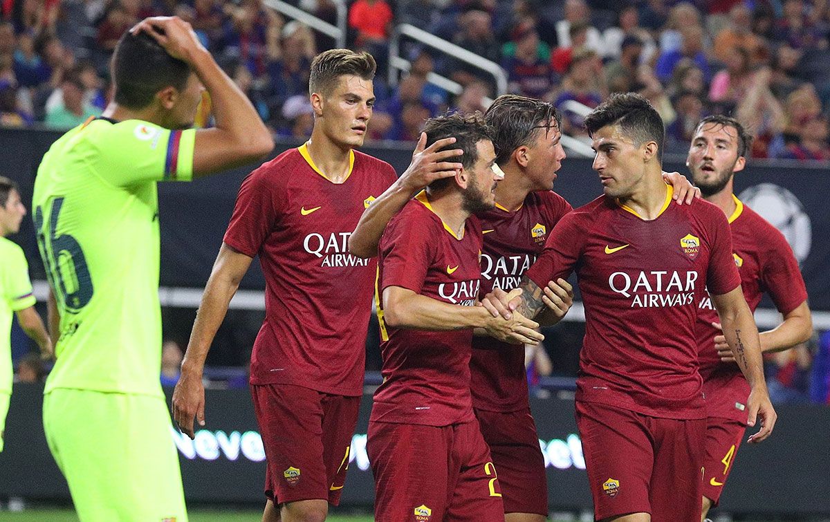 La Roma, celebrando un gol marcado contra el FC Barcelona