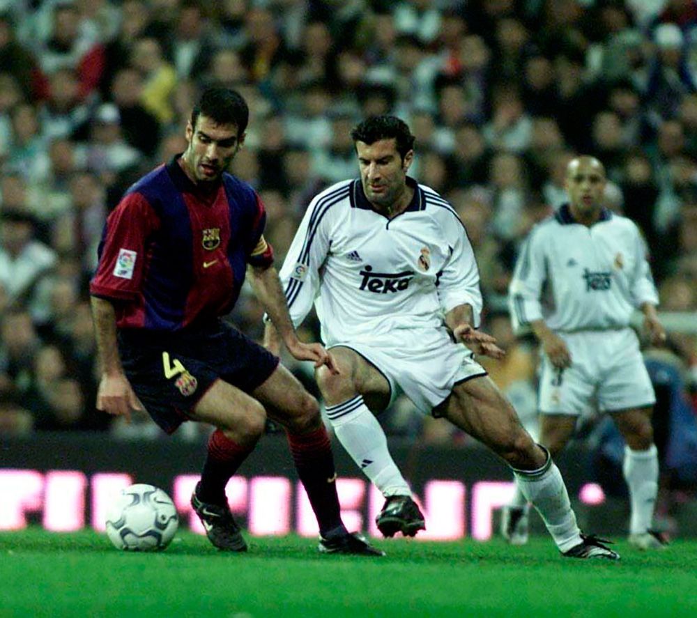 Luis Figo y Pep Guardiola en un Madrid-Barça