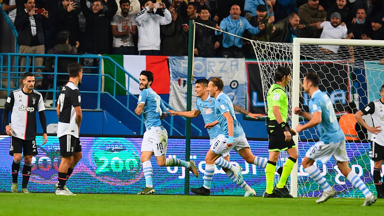The players of the Lazio celebrate a goal against the Juve
