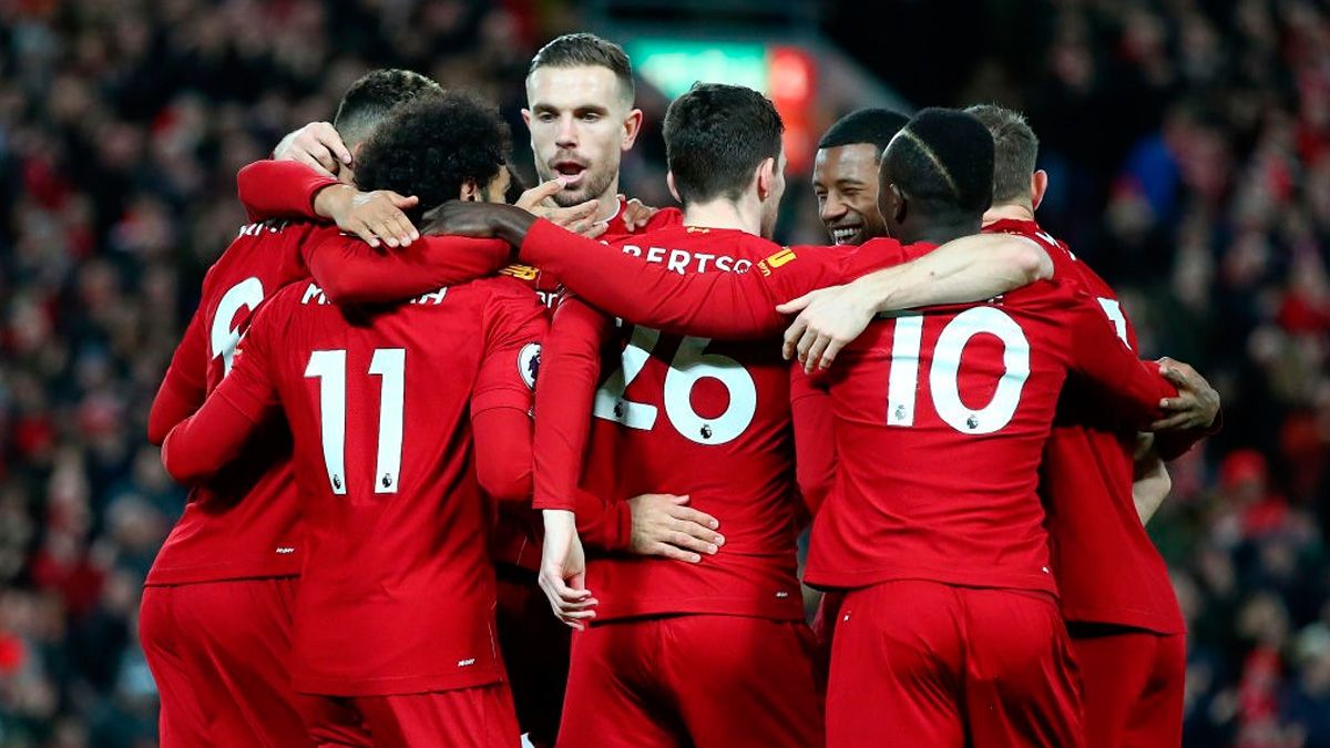 The players of Liverpool celebrate a goal in the Premier League