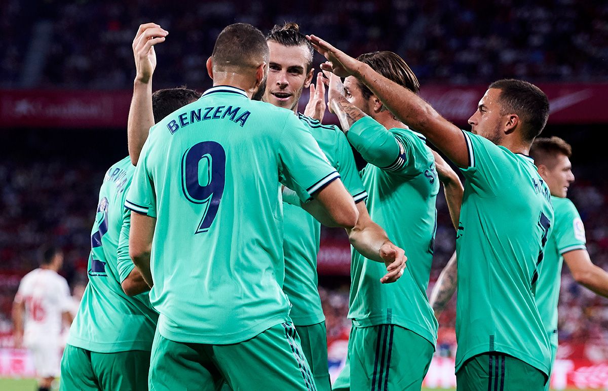 Gareth Bale and Karim Benzema, celebrating a goal with the Real Madrid