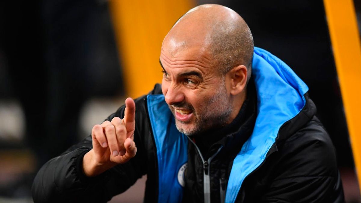 Pep Guardiola in a match with Manchester City