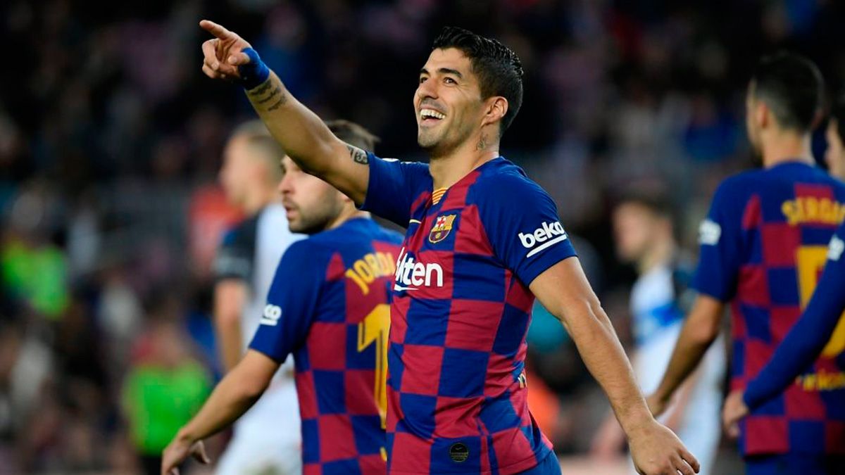 Luis Suárez celebrates a goal with Barça in LaLiga