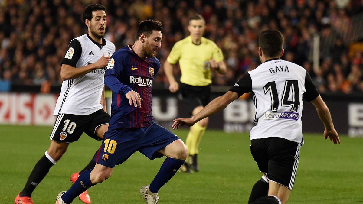 Leo Messi in a match between FC Barcelona and Valencia